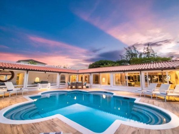 Sunset over the pool and detached villa Buttsbury House, Holders Polo Ridge, Barbados