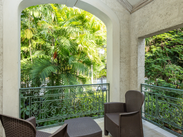 Patio at Mon Caprice, Sandy Lane, offers stunning views and luxurious outdoor living space in Barbados, perfect for relaxation.