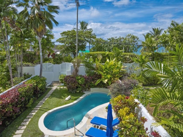Caribbean holiday house Jasmine Villa No.6, vioew of the pool with tropical trees
