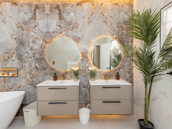 Barbados luxury modern beachfront villa master suite luxury bathroom with two sinks, shower and bath