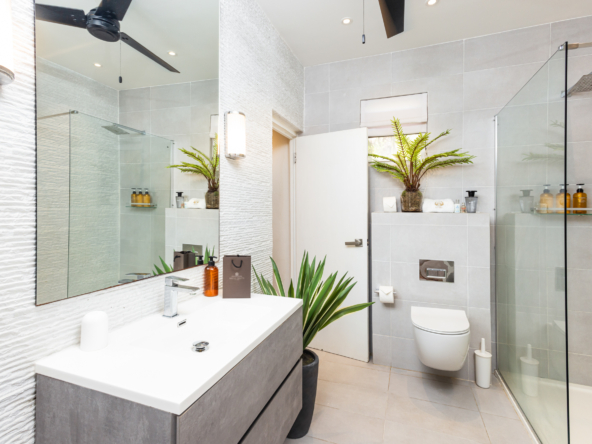 Barbados luxury modern beachfront villa guest suite bathroom