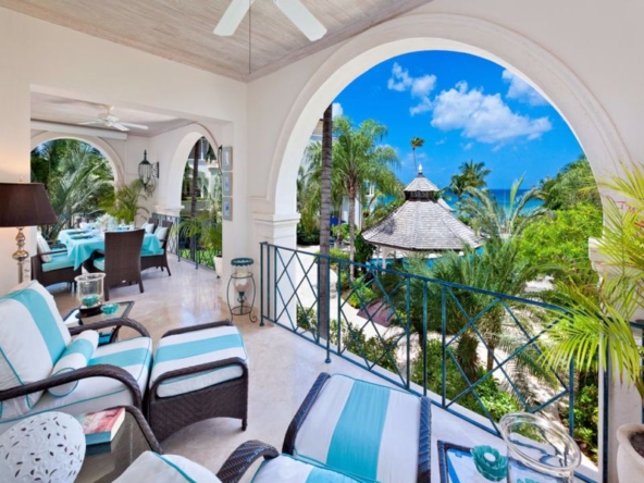 A tranquil image showcasing serene sea views and lush gardens, creating a perfect backdrop for relaxation in paradise.