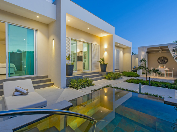 Exterior and pool of modern West Coast villa for rent in Barbados, Footsteps North Cottage
