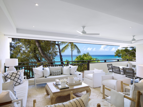 White furnished balcony and sea view at Beachi, Coral Cove, Paynes Bay