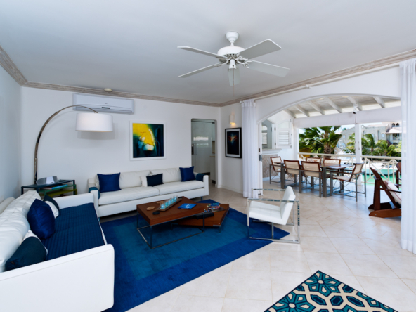 Living room in white and blue in an apartment in Port St. Charles.