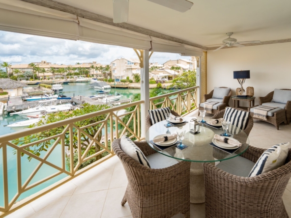 Furniture on a balcony at Luxury resort Port St. Charles