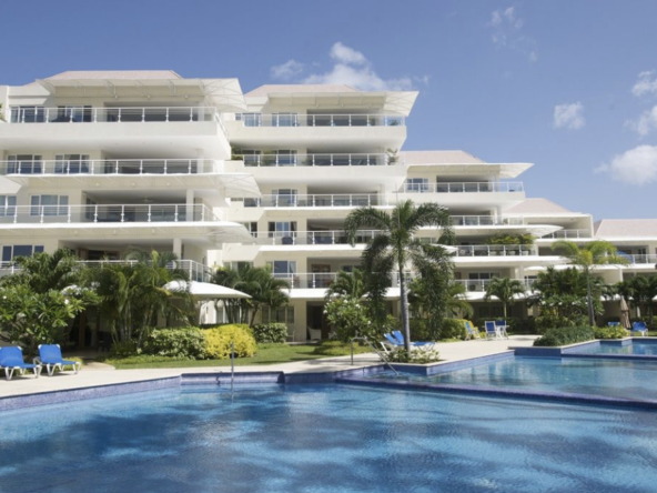 Exterior and pool of Barbados south coast condo, Palm Beach
