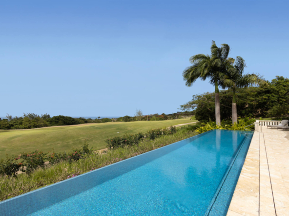 Pool and blue sky view at Apes Hill Club villa Cocomaya