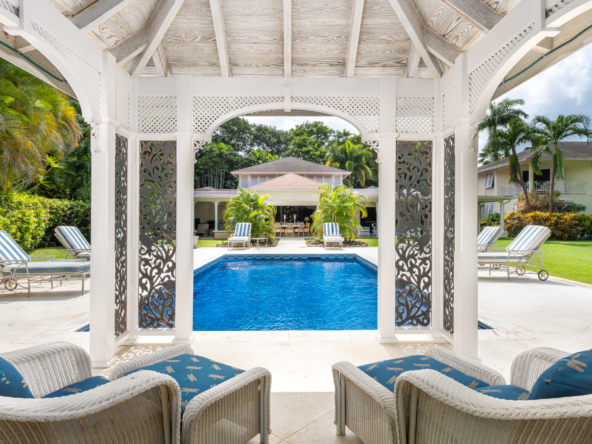 presents for sale Oriana Luxury Home, an exquisite residence nestled in the prestigious Sandy Lane Estate. The highlight of Oriana is its magnificent pool, surrounded by lush tropical gardens and ample outdoor lounging spaces.