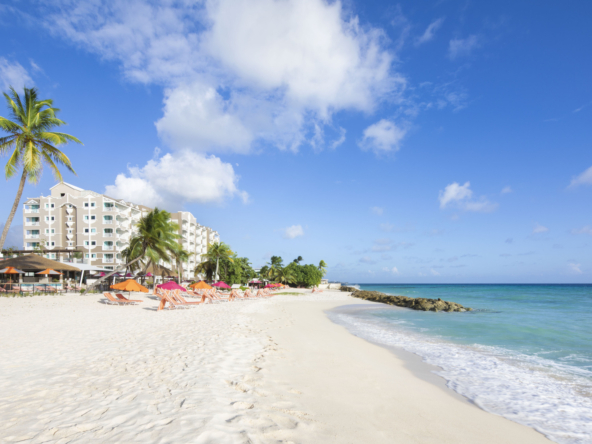 The pristine beach at O2 Beach Club & Spa beckons with its crystal-clear waters and soft white sands, offering the ultimate beachfront escape in Barbados.