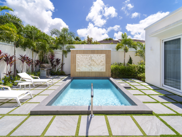 Luxury detached villa for sale in Barbados' West Coast. Fully furnished 3-bed home in gated community with private pool and modern finishes.